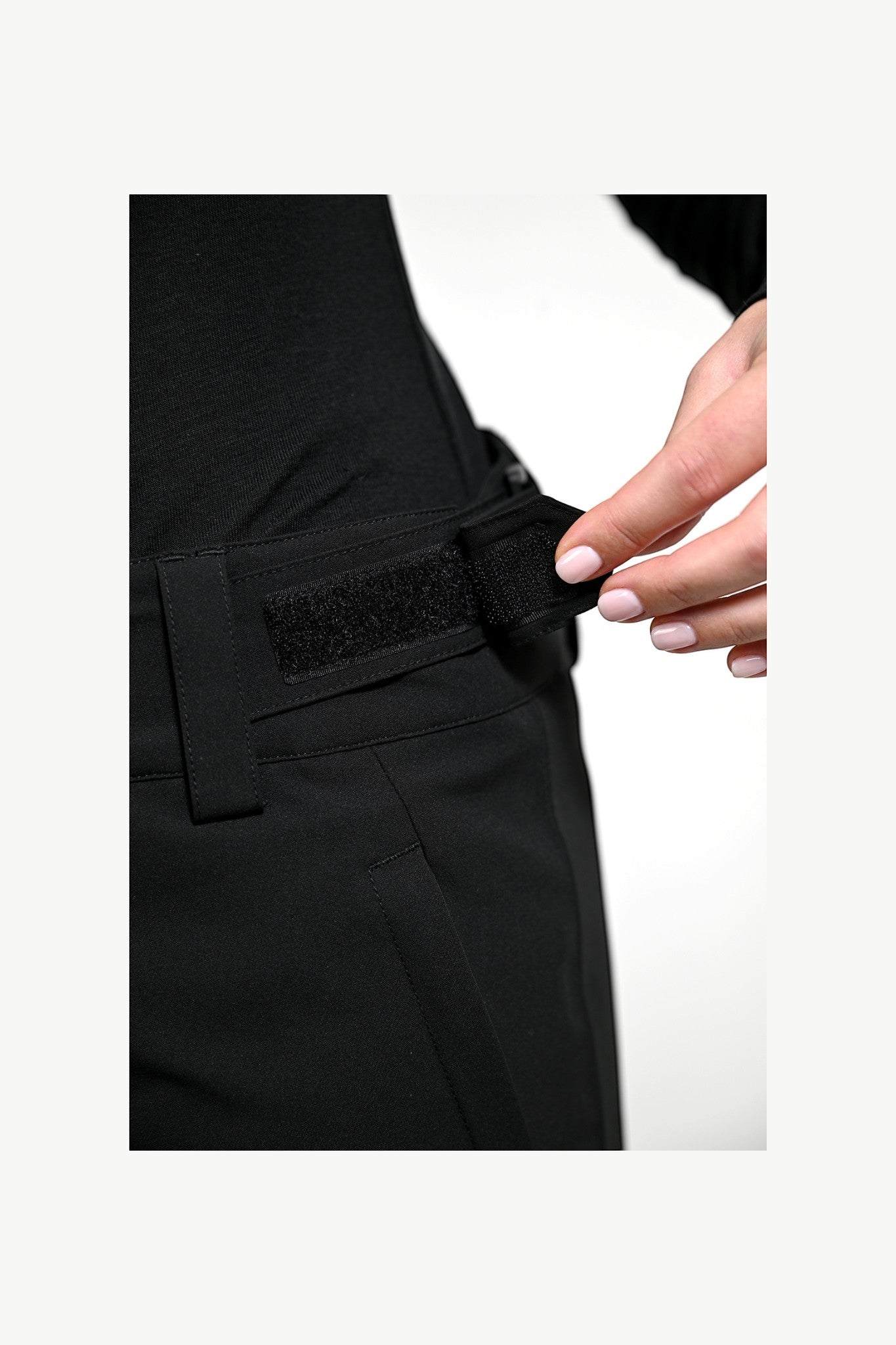 Snow by Clo Jessica Pant in black featuring an adjustable velcro waistband for a secure, custom fit.