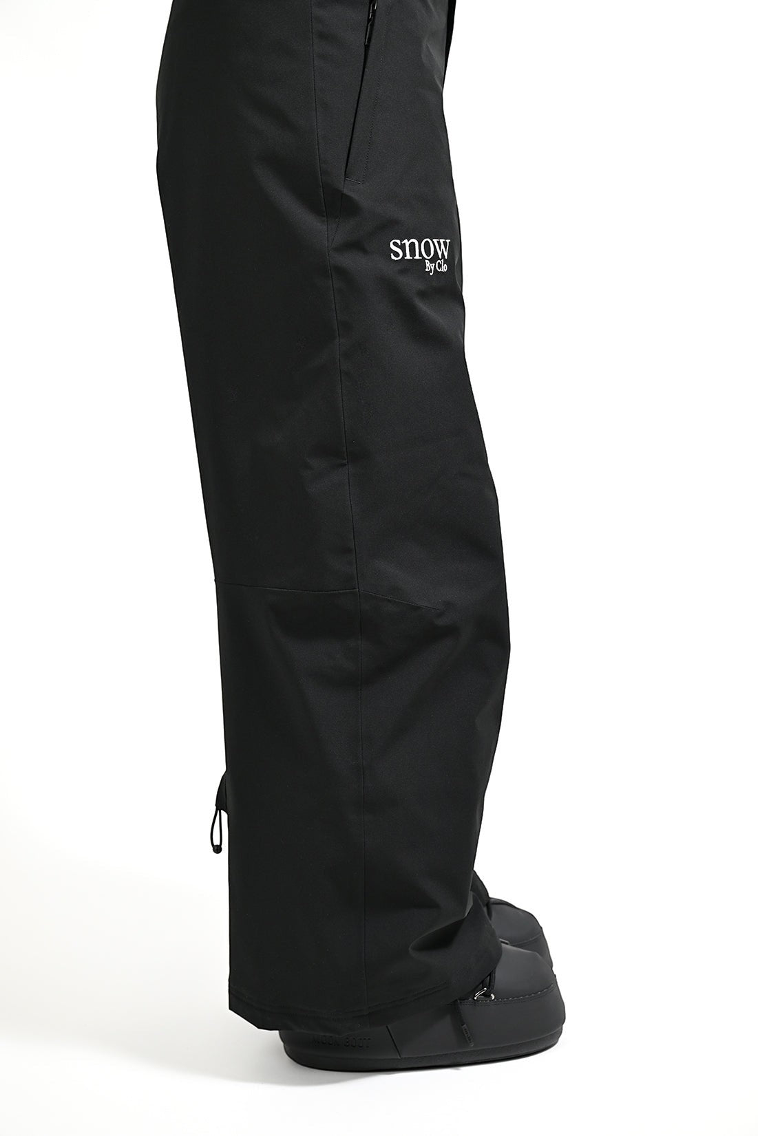 Snow by Clo Jessica Pant in black, a petite-friendly waterproof ski pant with a branded logo and zip pocket.